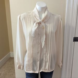 Vintage LaBlouse cream button down blouse with tie at neck. Size Large